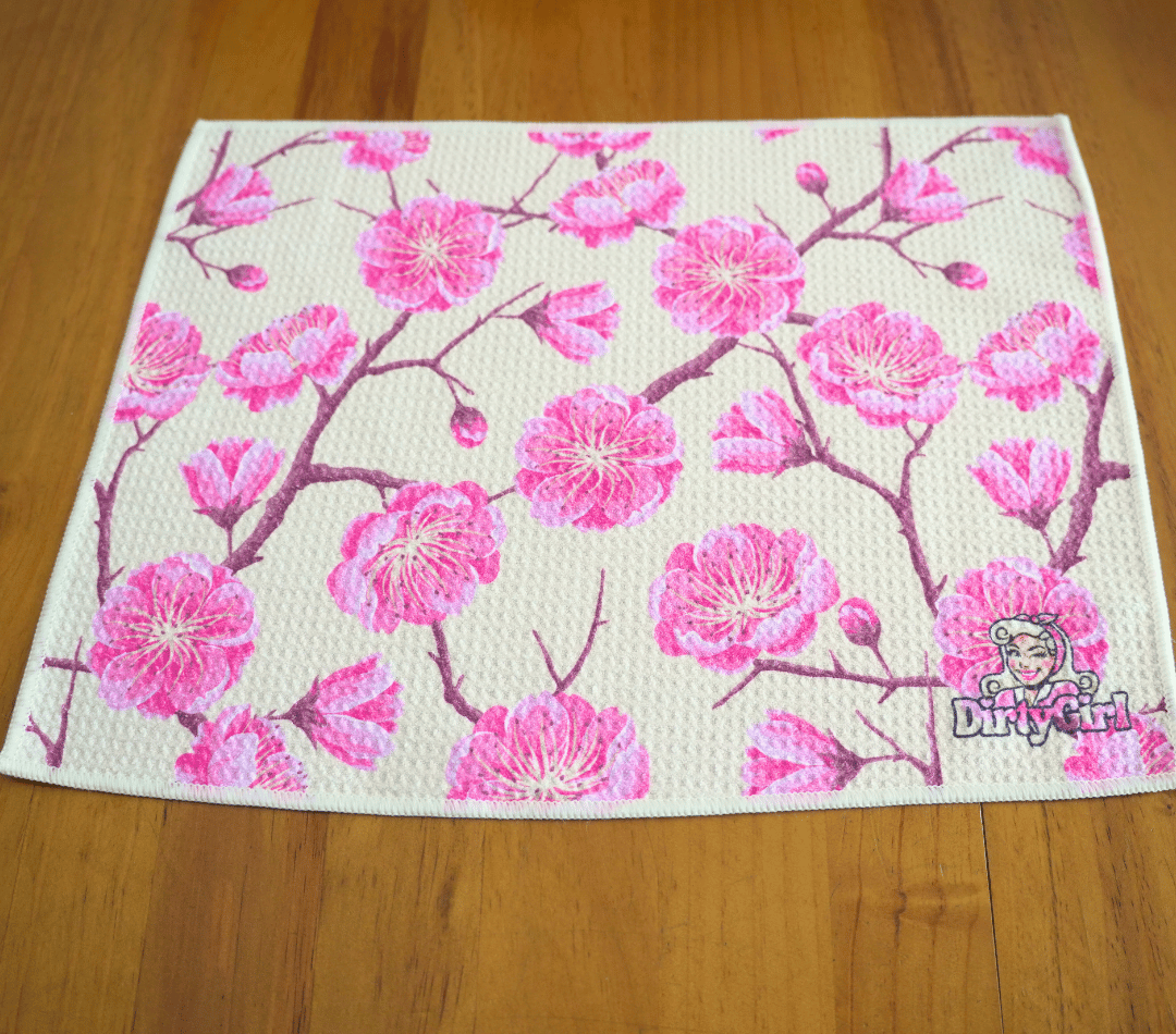 Flatlay of DirtyGirl Blossom Bloom Cloth laid flat on benchtop – Quick-drying fabric