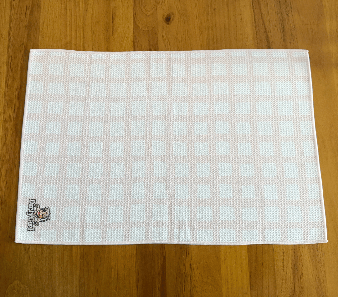 Flatlay of DirtyGirl Classic Pink Cloth laid flat on benchtop – Quick-drying fabric