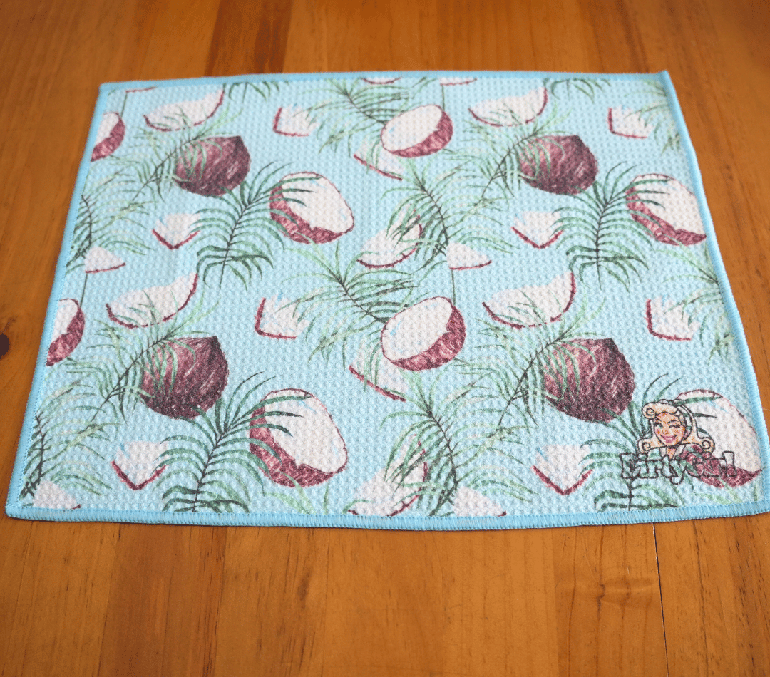 Flatlay of DirtyGirl Coconut Glow Cloth laid flat on benchtop – Quick-drying fabric