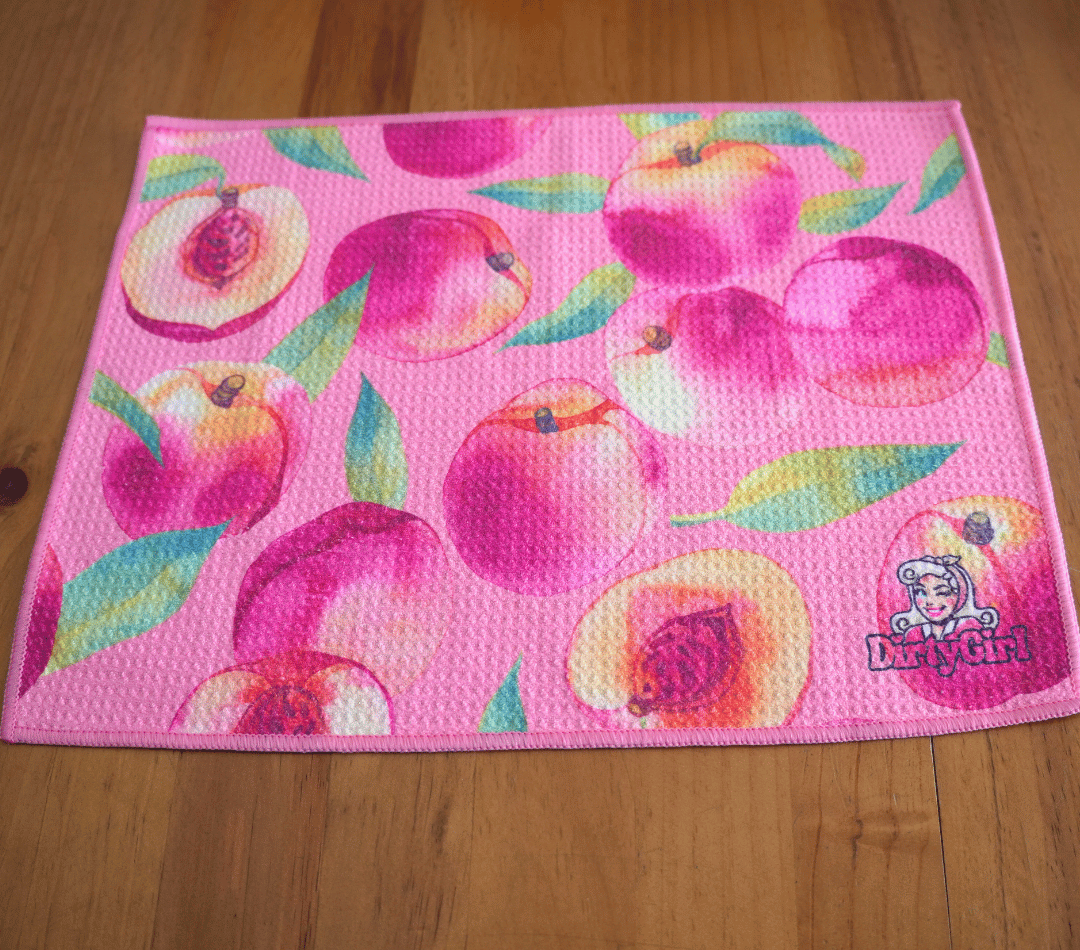 Flatlay of DirtyGirl Peachy Clean Cloth laid flat on benchtop – Quick-drying fabric