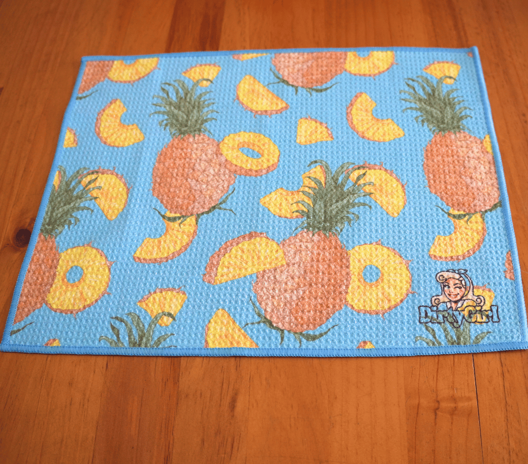 Flatlay of DirtyGirl Pineapple Express Cloth laid flat on benchtop – Quick-drying fabric