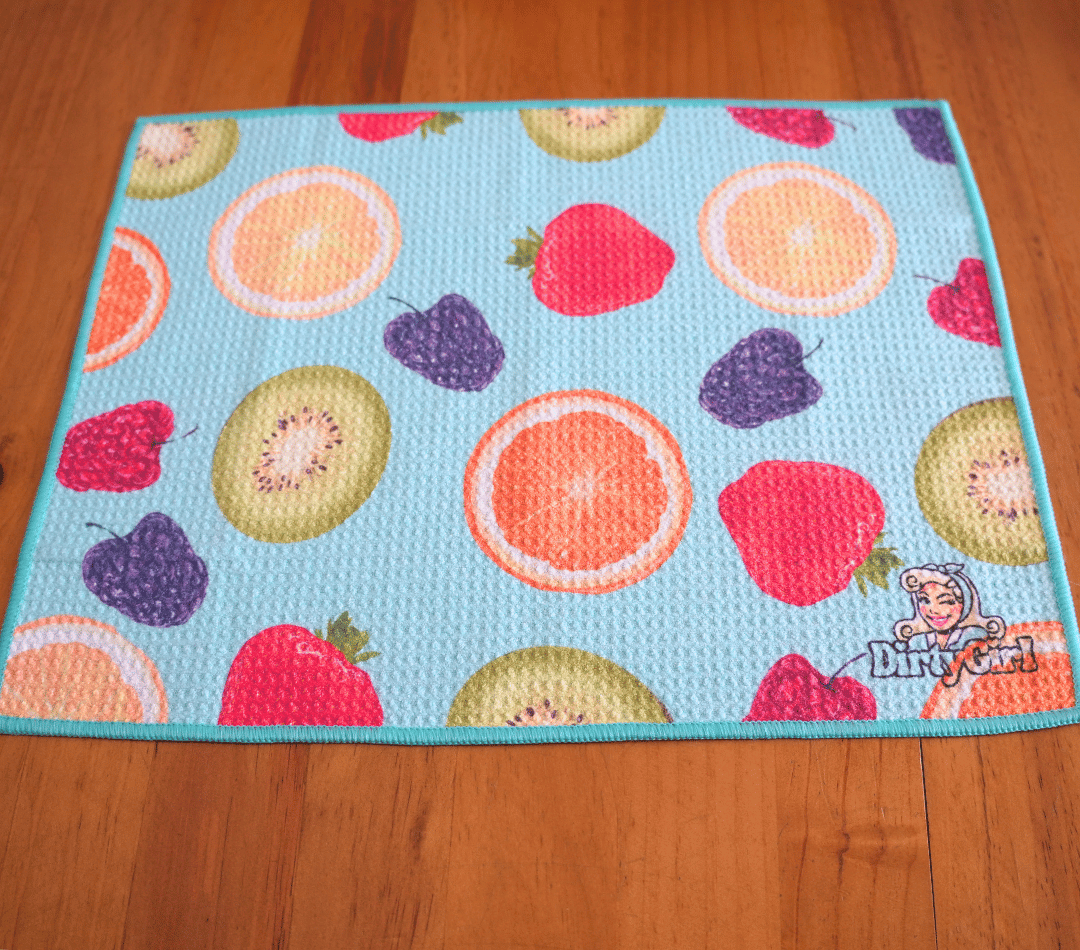 Flatlay of DirtyGirl Tutti Frutti Cloth laid flat on benchtop – Quick-drying fabric