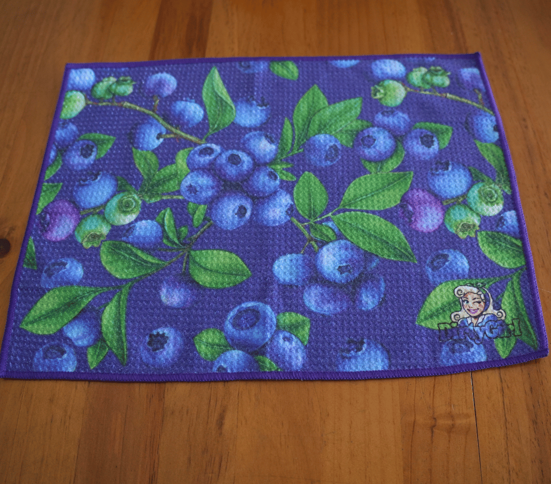 Flatlay of DirtyGirl Berry Fresh Cloth laid flat on benchtop – Quick-drying fabric